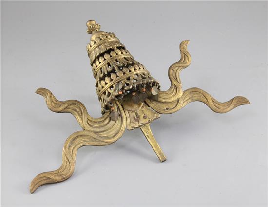 A Sino-Tibetan bronze model of the Buddhist emblem of a parasol, width 34.5cm